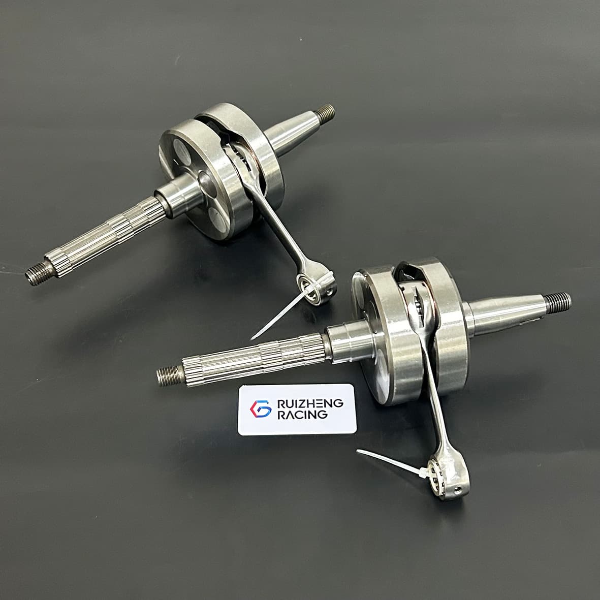 Two Piaggio 150 2T racing crankshafts